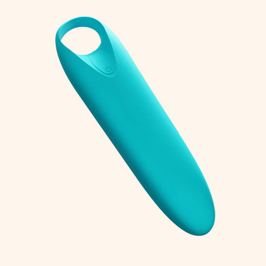 Red Candy Massager placed on a plain background.