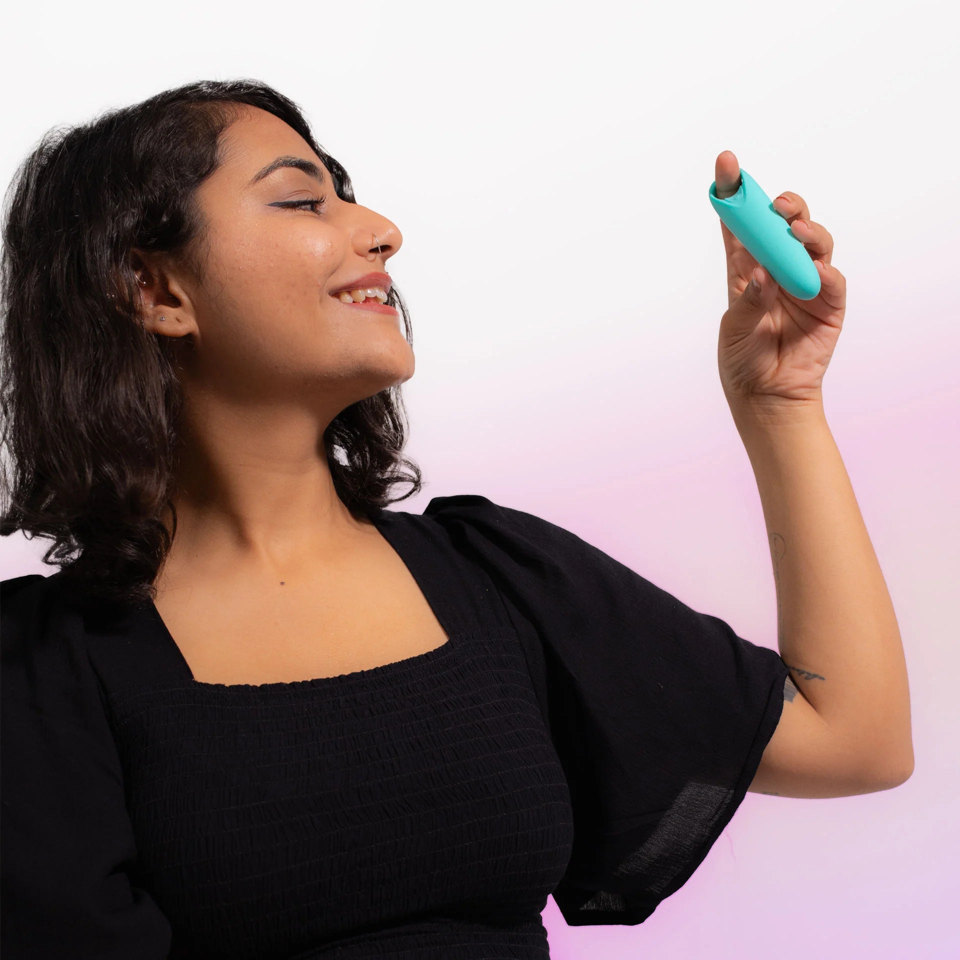 Women Examining Bubbly Blue Candy Personal Massager