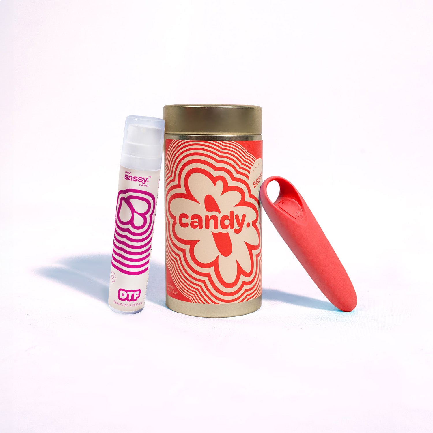 Retro Red Candy Personal Massager Displayed with DTF Aloe-Based Personal Lubrication