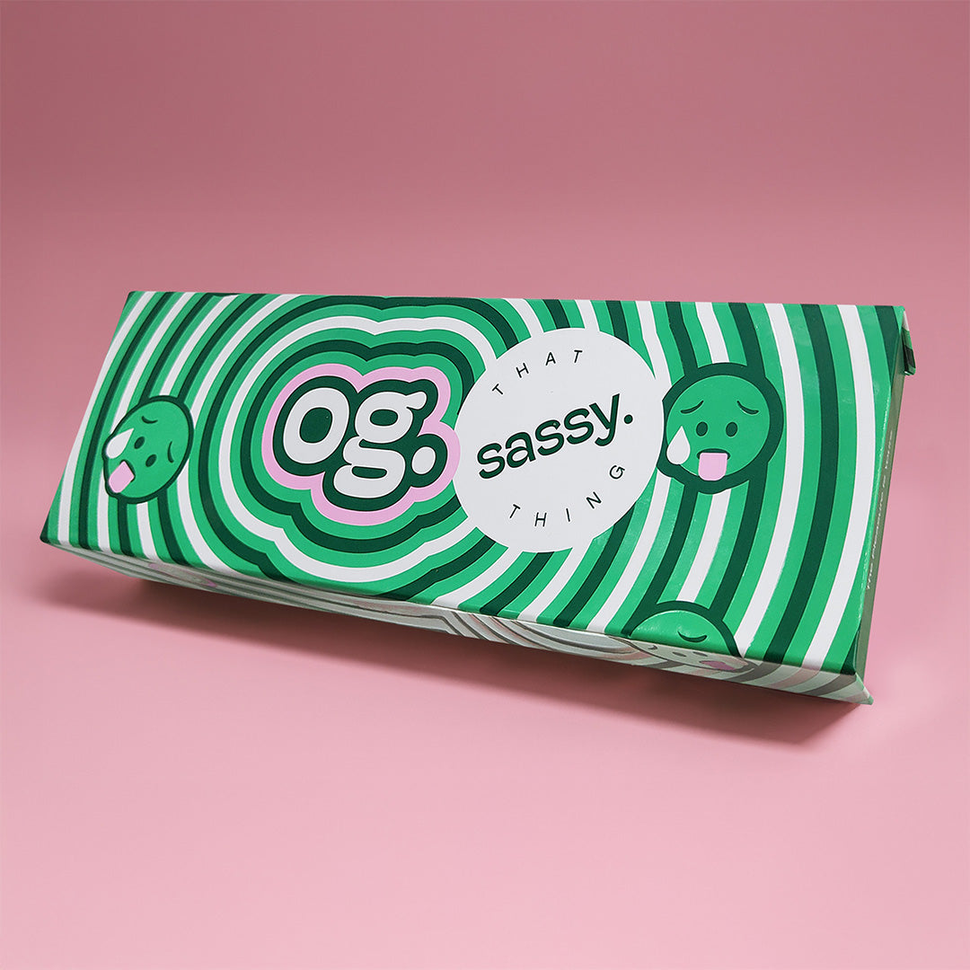 OG female personal massager box packaging with green striped design by That Sassy Thing.