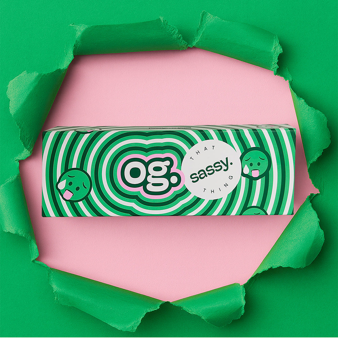 OG personal massager box packaging in green and pink design by That Sassy Thing.