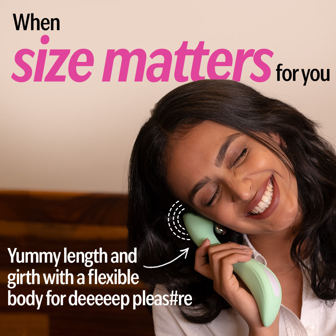 Smiling woman holding OG personal massager for women with flexible length and girth.