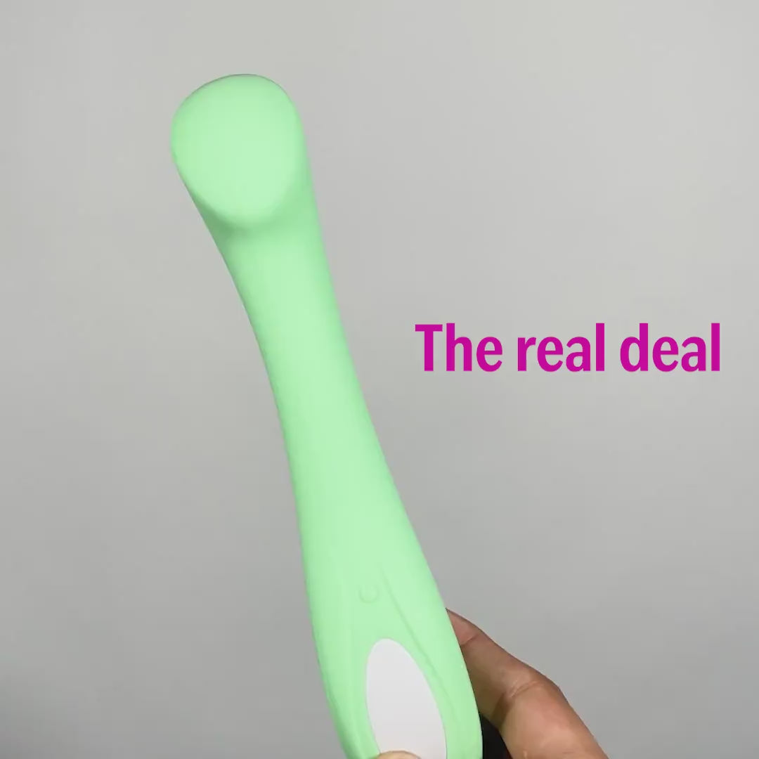 OG personal body massager for women in green with curved design.