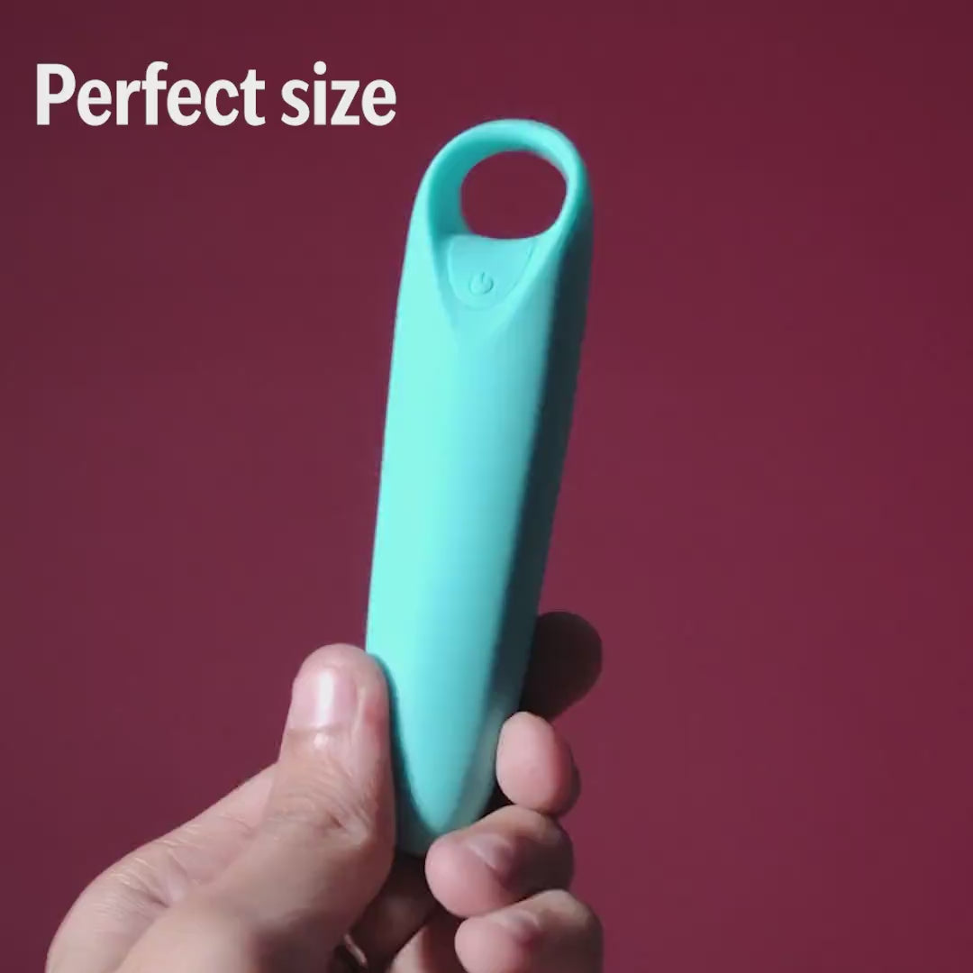 Hand holding a blue Candy handheld massager against a red background with text overlay reading 'Perfect size'