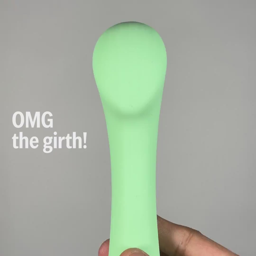 Close-up of OG female personal massager head with curved girth design.