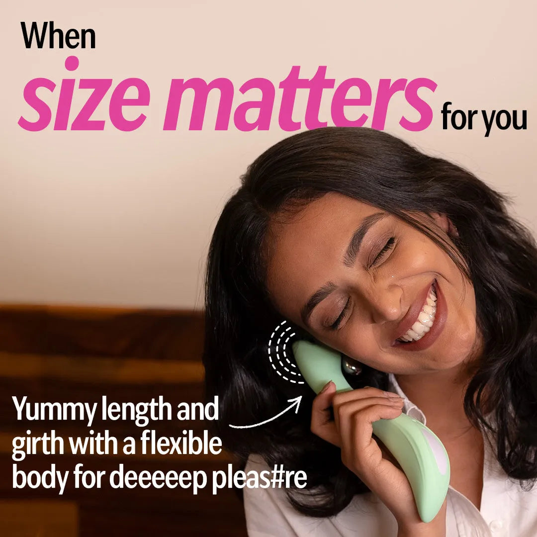 Smiling woman holding OG personal massager for women with flexible length 
and girth.