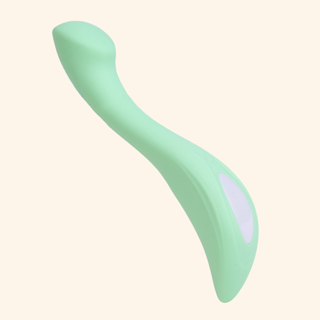 Green OG massager for women with curved ergonomic design.