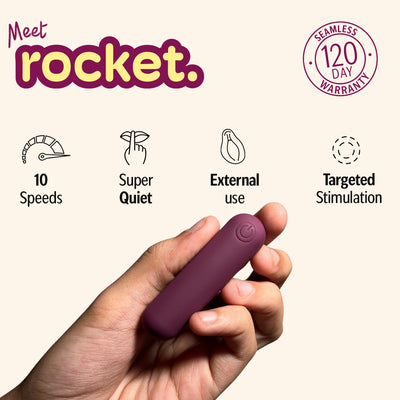 Hand holding rocket bullet massager with features shown