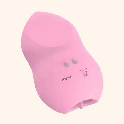 Pink tongue massager called Tickleon white background